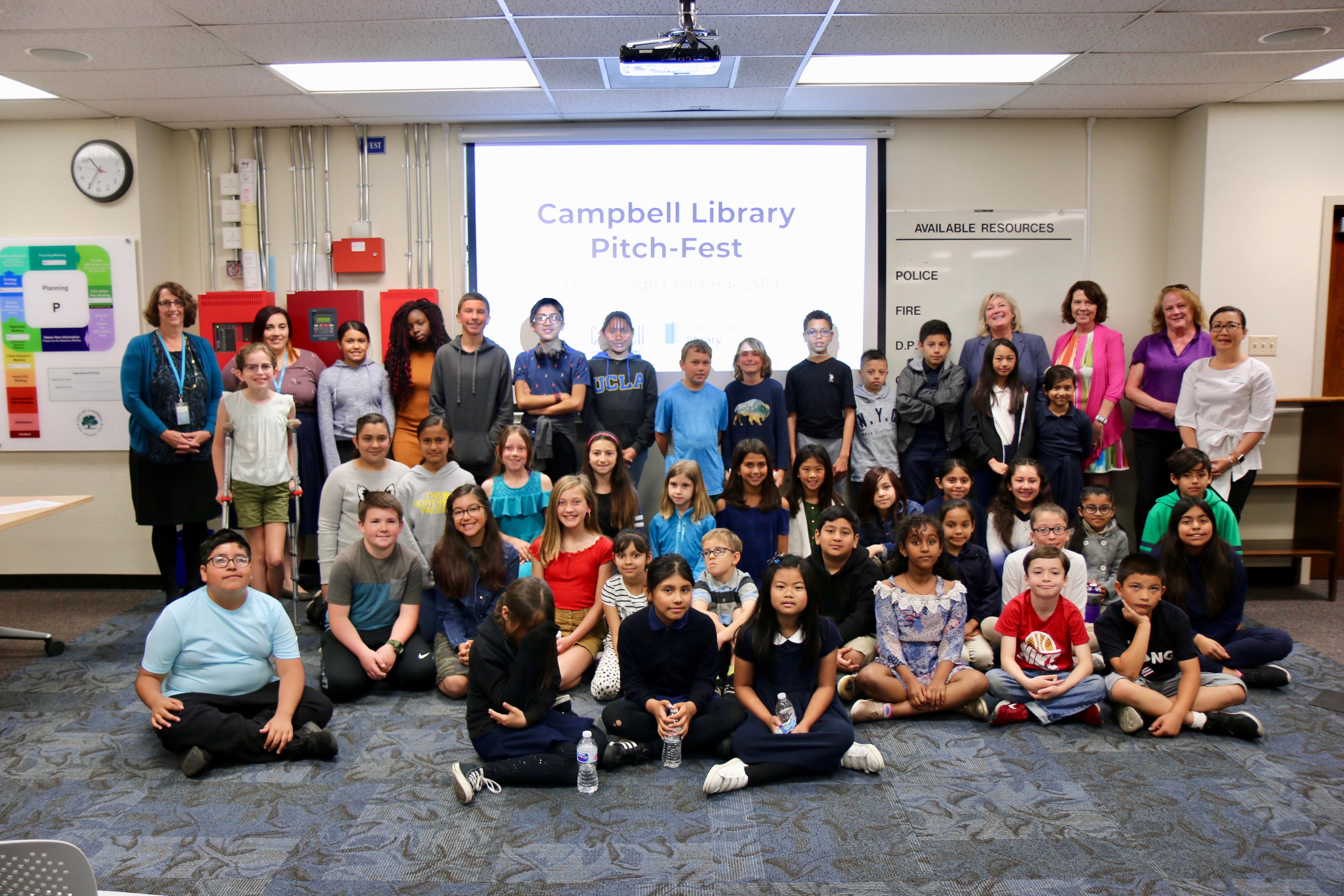 Student participants and district and community leaders pose for a photo at the 2019 Pitch Fest.