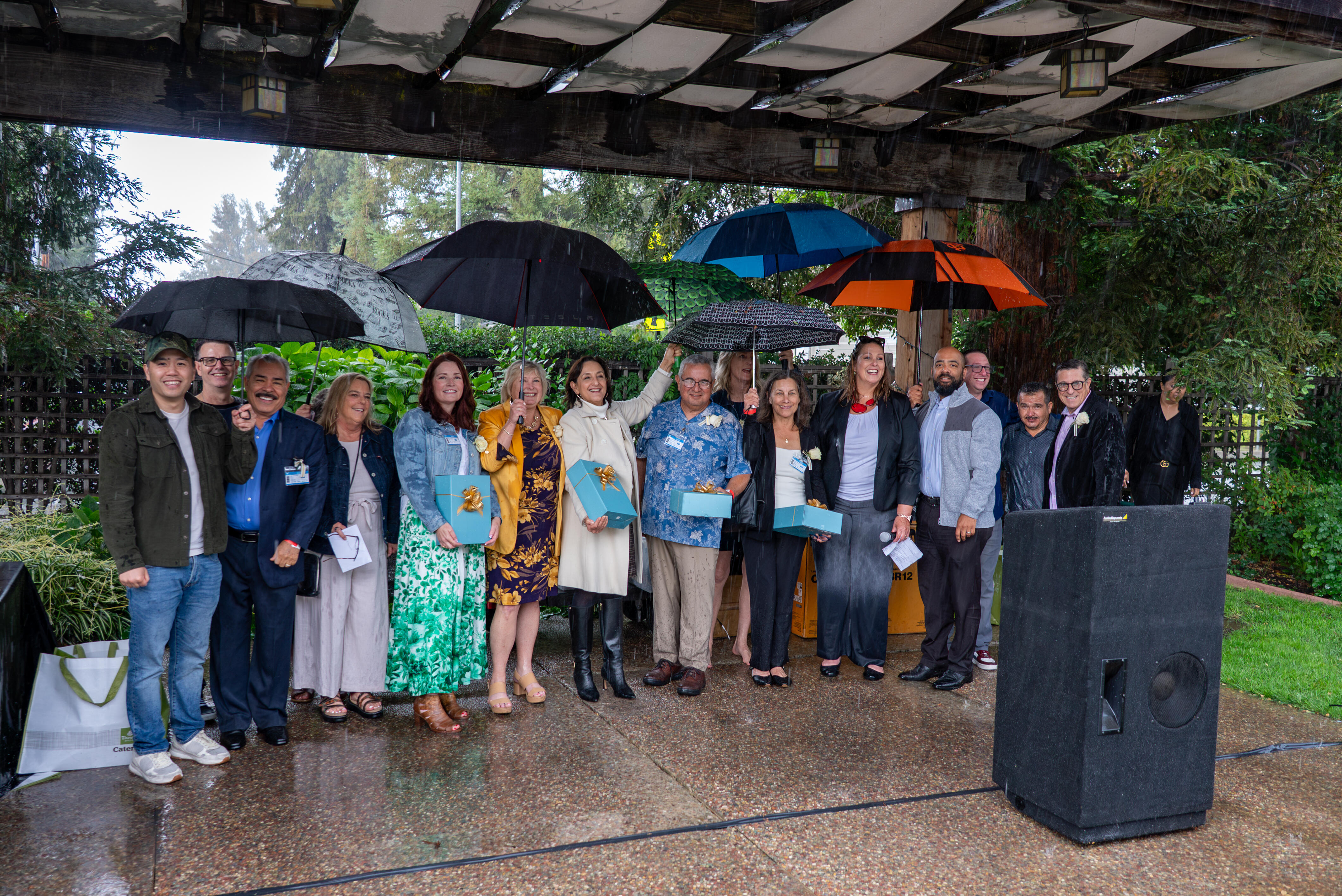 CUSD's 2026 retirees gather together in the rain for a retirement celebration