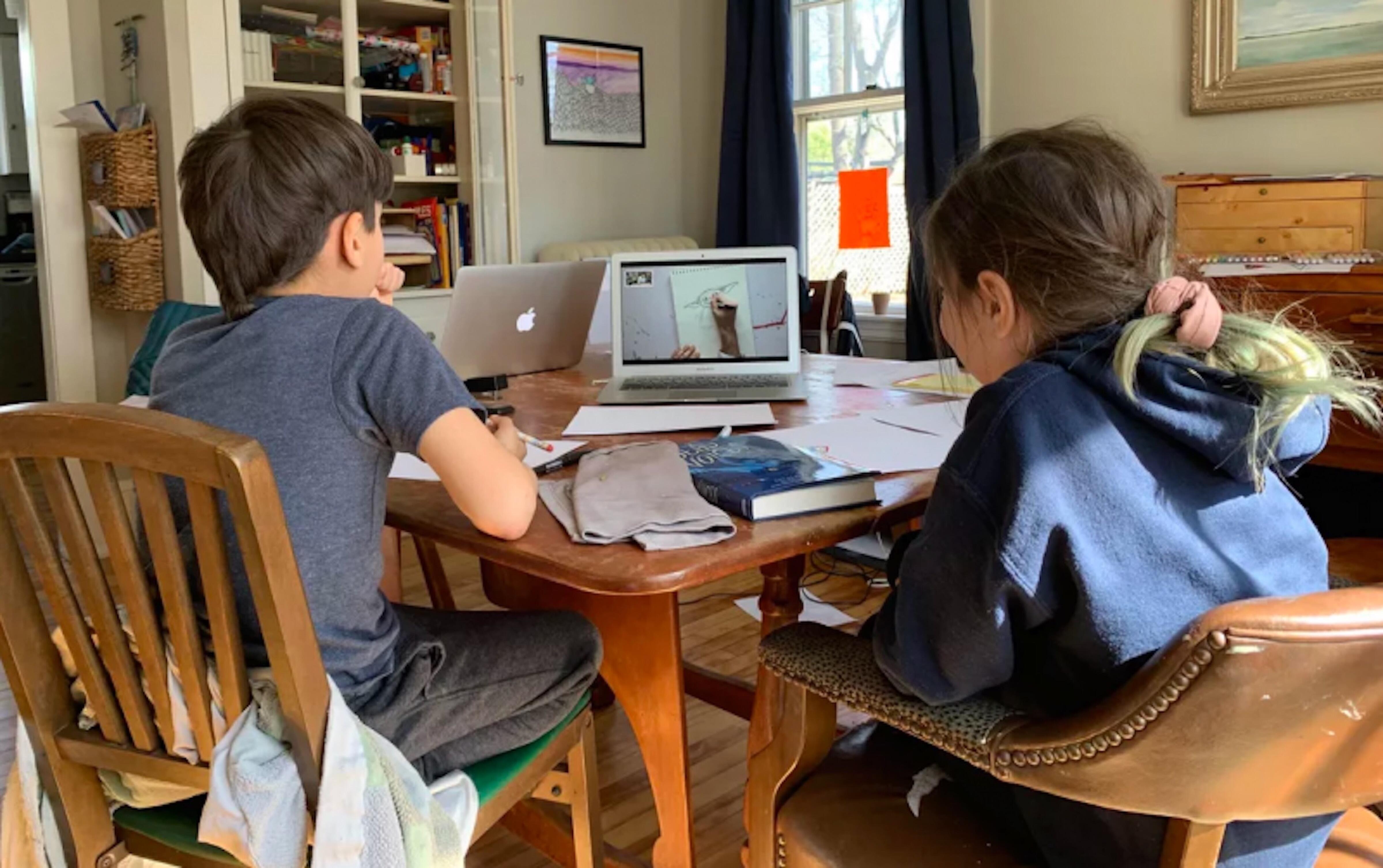 two students learning from home