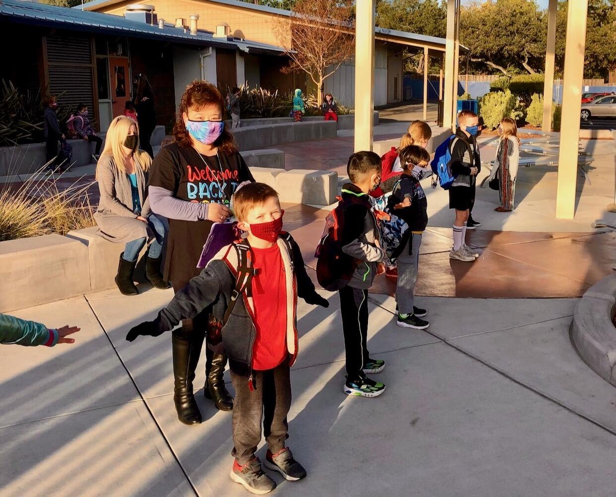 Teacher with students lined up