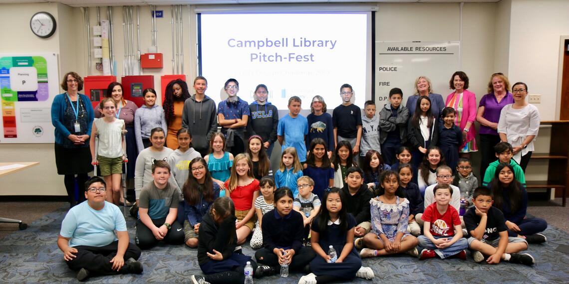 Student participants and district and community leaders pose for a photo at the 2019 Pitch Fest.