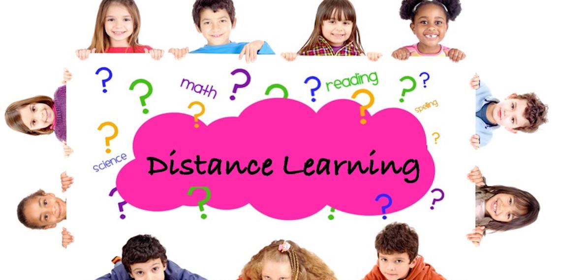 children holding sign that says distance learning