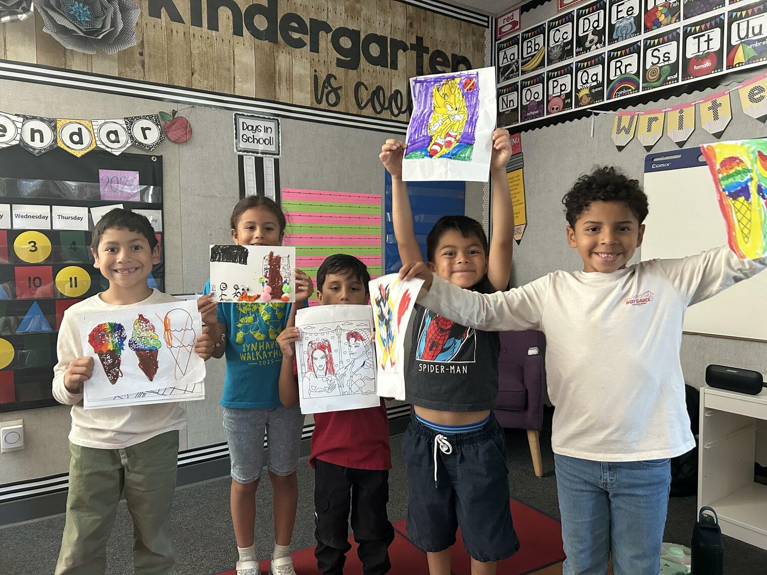 Expanded Learning students proudly display their summer art projects.