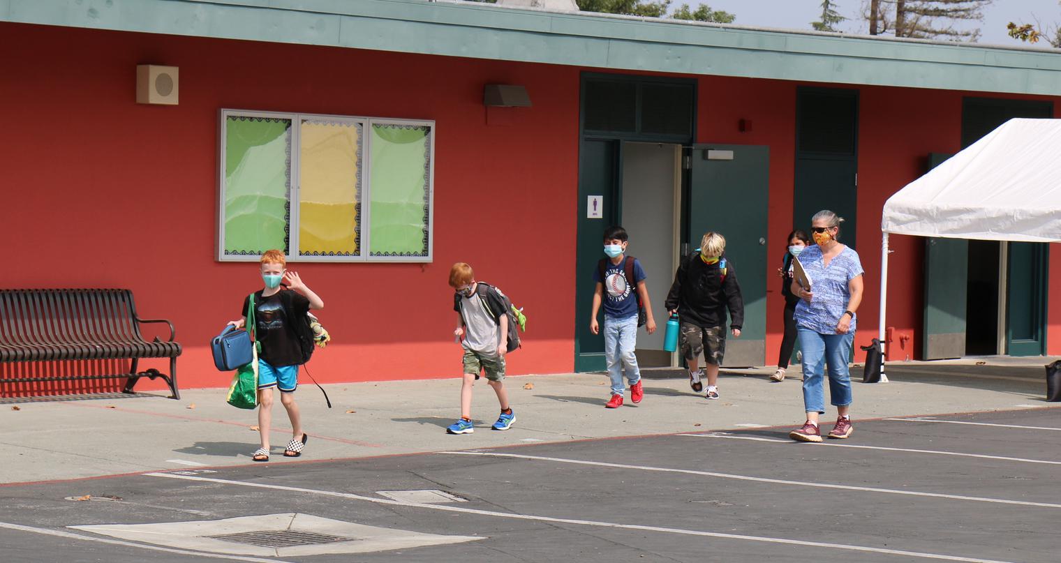 students socially distance on campus